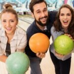 Friends are enjoying bowling at Best Bowling Alleys in Phoenix AZ