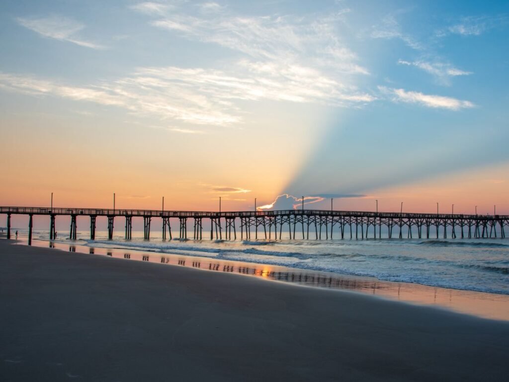 Sunrise at Surf City Pier Topsail Island Sunrise⁠ Image by Penny Britt from Getty Images