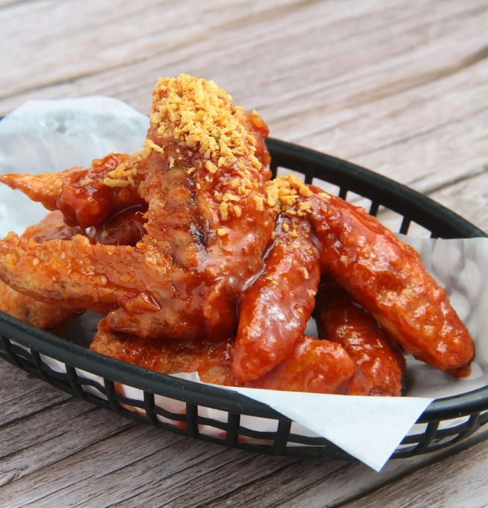 Best Wings Atlanta, Freshly cooked flavored chicken wings Image by junpinzon from Getty Images