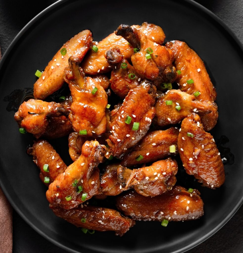 Kens Wings atlanta, Sweet and spicy chicken wings Image by Tatiana Volgutova from Getty Images